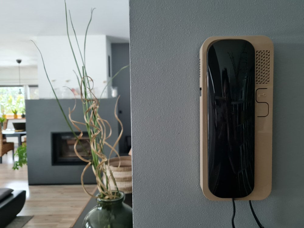 Unifon CYFRAL Smart-D Biały prosta obsluga jeden ruch palaca wcisnac przytrzymac przycisk na panelu glownym dezaktywacja zabezpieczenia mozliwosc wejscia do budynku