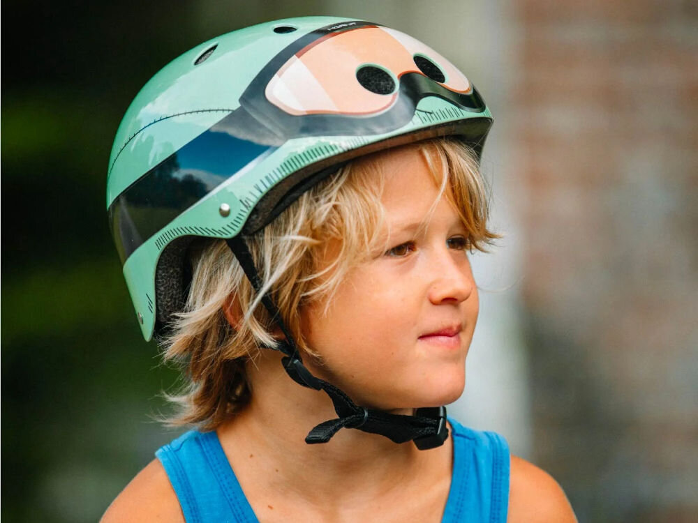 Kask rowerowy HORNIT Military Zielony dla Dzieci (rozmiar S) normy bezpieczeńswa wesoły motyw