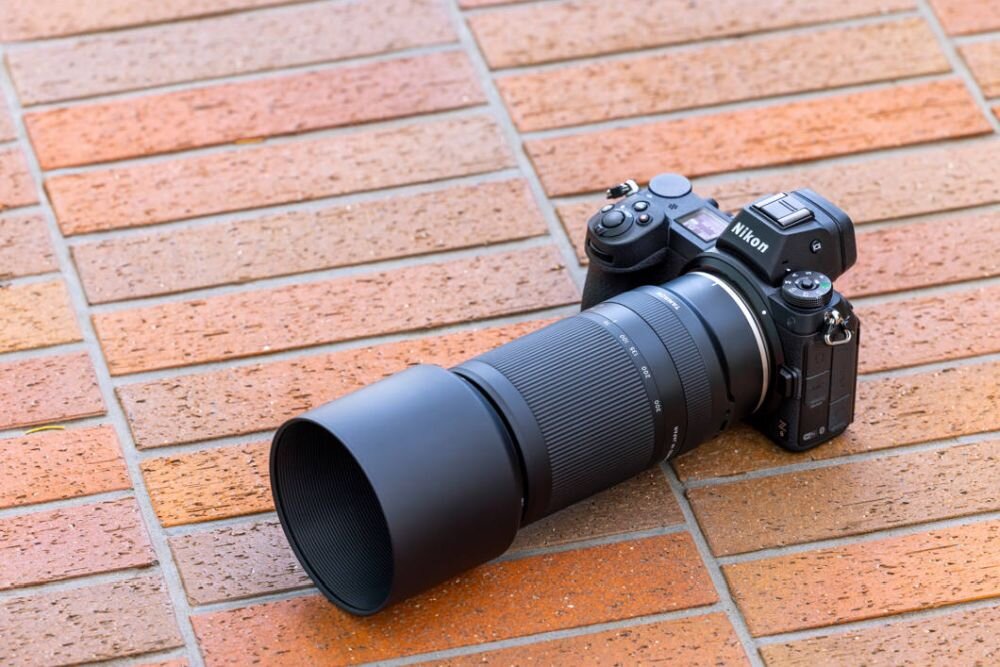 Obiektyw TAMRON 70-300mm F-4.5-6.3 DI III RXD Nikon Z ogniskowa przysłona ostrość pierścienie optyka soczewki powłoki montaż bagnet światło jasność zoom filtry waga