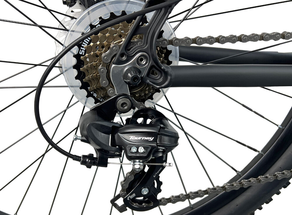Rower górski MTB INDIANA X-Pulser 2.7 D15 27.5 cala damski Czarno-miętowy zbliżenie na tylną przerzutkę przerzutki marki SHIMANO przednie i tylne przerzutki SHIMANO Tourney duża wytrzymałość sprawne działanie zmiana biegów jest płynna i bezproblemowa 21 biegów