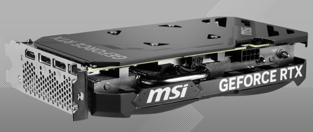 Komputer MAD DOG DIAXID605F-I11DB32 i5-13400F 32GB RAM 1TB SSD GeForce RTX4060 DLSS 3 Wi-Fi karta graficzna MSI GeForce RTX 4060 Ventus 2X Black OC, przemyślana konstrukcja karty graficznej, wzmocniona tylna płyta, dodatkowe bezpieczniki,
					obsługa do czterech monitorów, port HDMI 2.1a obsługujący obraz w jakości 4K przy 120 Hz, 3x port DisplayPort 1.4a, oprogramowanie MSI Center, możliwość dostosowania parametrów, karta graficzna w pozycji poziomej na szarym tle, widoczny tylny panel oraz porty