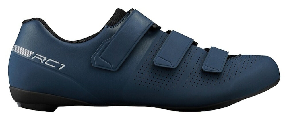 Buty rowerowe SHIMANO SH-RC102 Granatowy rozmiar 44 but na jasnym tle widoczny z boku trzy praktyczne paski na rzepy umieszczone odwrotnie względem podbicia stabilność komfort noszenia stopa leży pewnie w bucie