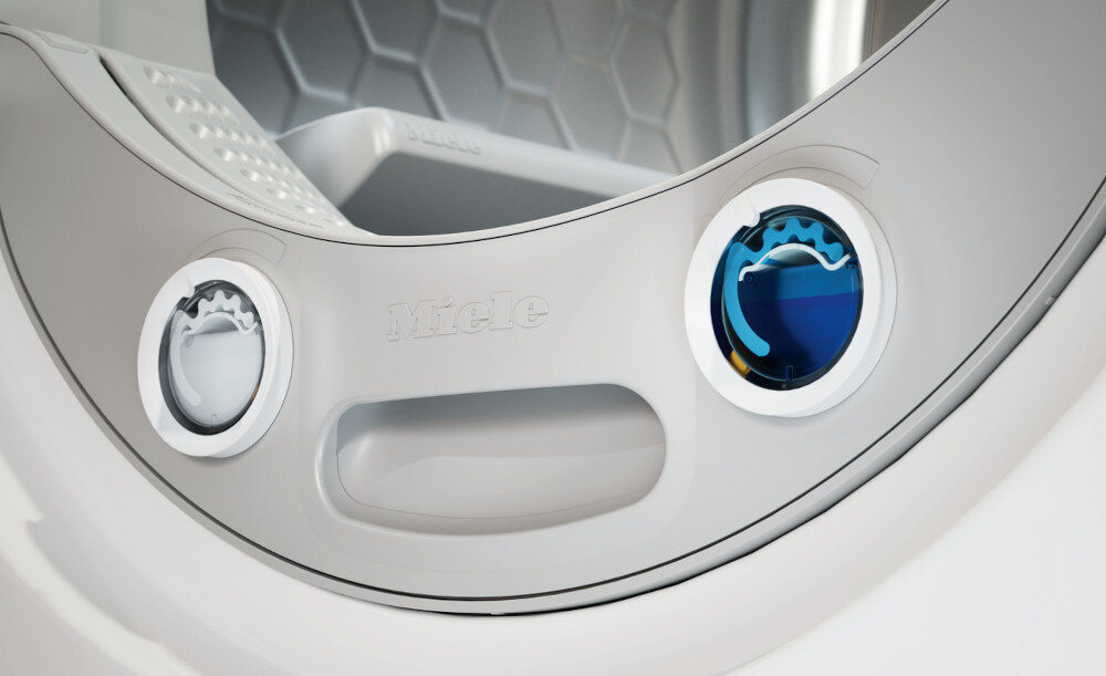 Suszarka MIELE TWC640WP EcoSpeed zdjęcie wizualizacyjne lifestyle kapsułki zapachowe płyn System zapachowy FragranceDos kapsułki zapachowe różnorone zapachy wybór dla wrażliwej skóry
