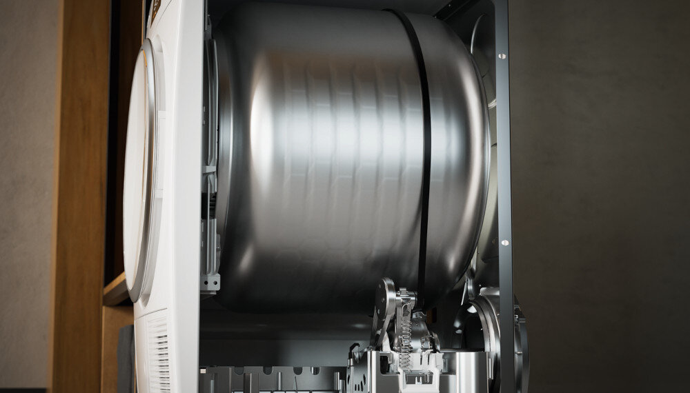 Suszarka MIELE TWC640WP EcoSpeed zdjęcie wizualizacyjne lifestyle konstrukcja wnętrze budowa bębna testy wydajność 7500 godzin 20 lat użytkowania podzespoły modele fazy rozwoju