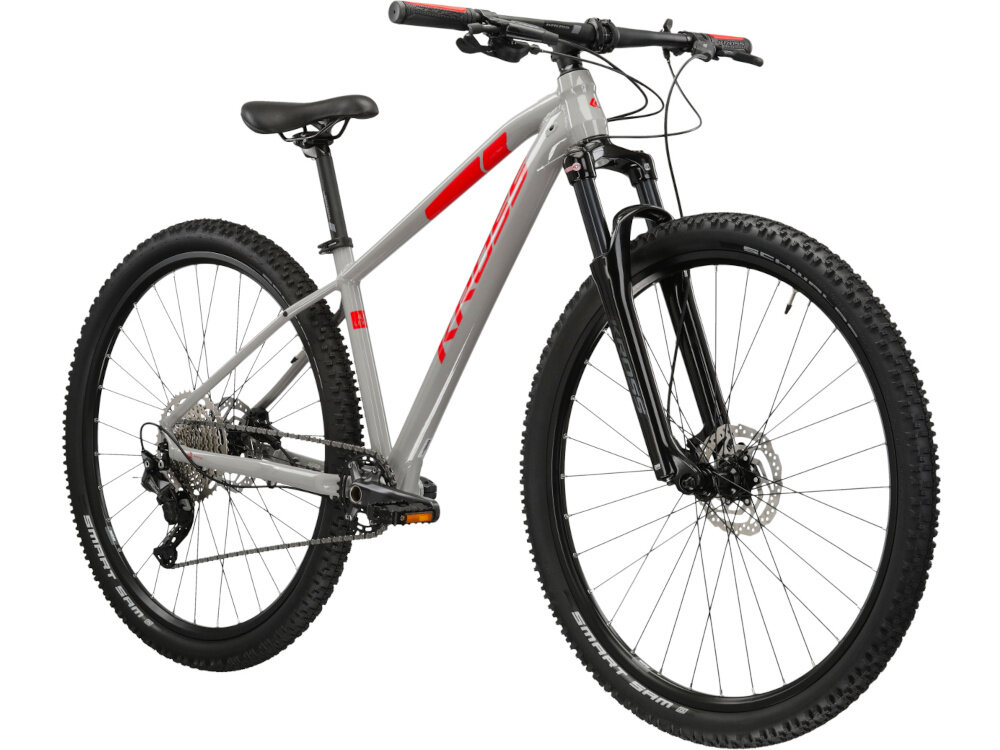 Rower górski MTB KROSS Level 4.0 M16 Guli 29 cali męski Szaro-czerwony rower na białym tle widoczny od przodu pod skosem środek codziennego transportu relaks pasja uniwersalność