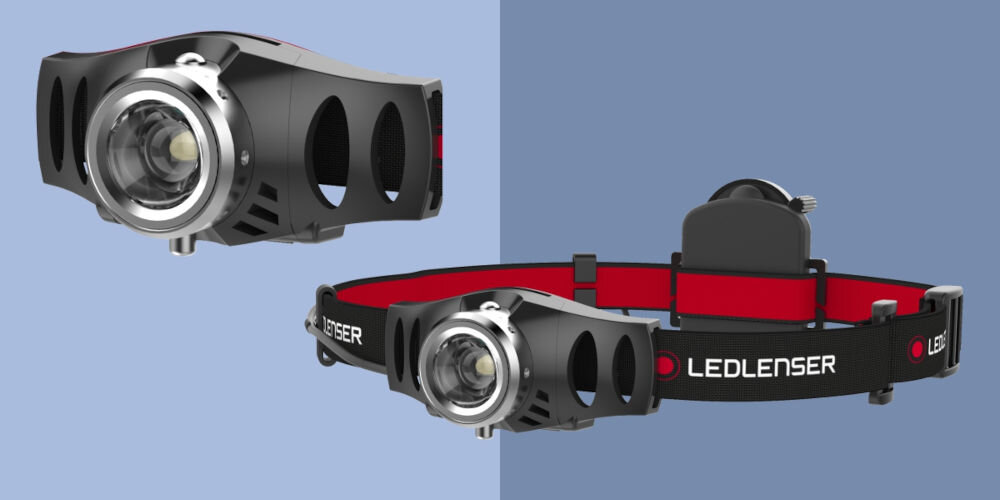 Latarka LEDLENSER H3.2 niebieskie tło czarna latarka czerwone elementy solidny model wszechstronne zastosowanie nocne treningi biegowe relaksujące wieczory z książką w namiocie strumień światła o mocy 120 lumenów zasięg do 100 m w terenie w codziennych sytuacjach wymagających wydajnego oświetlenia dla aktywnych osób  podróżników komfort bezpieczeństwo po zmroku
